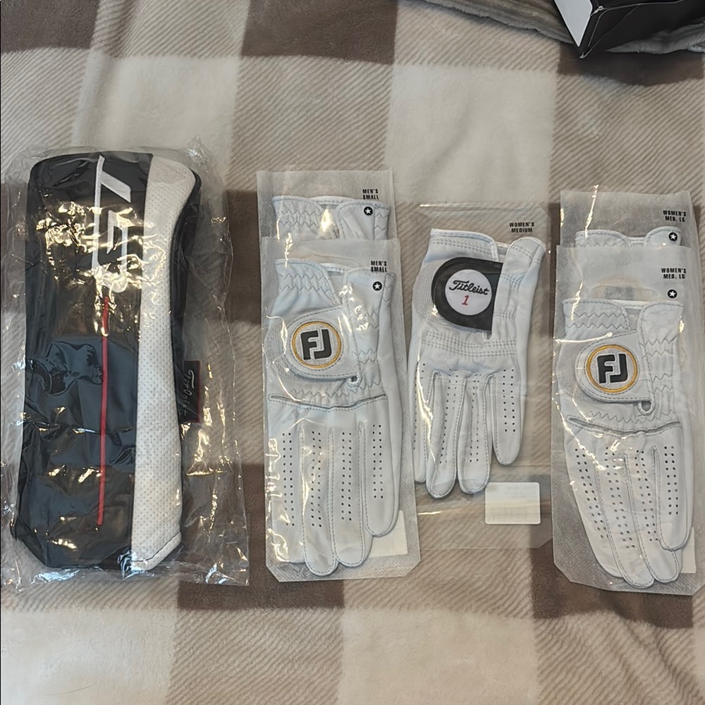 Men and women’s FootJoy White Golf Gloves with Black and Gold Accents